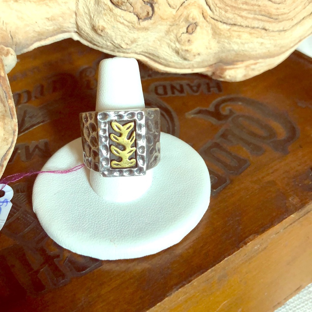 Hammered silver ring with leaf inlay